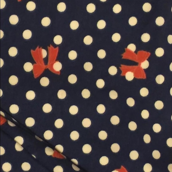 Lularoe TC navy polka dot with red bows.