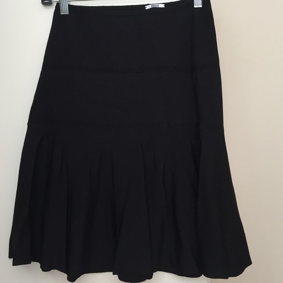 WOLFORD black tight skirt that comes out at bottom