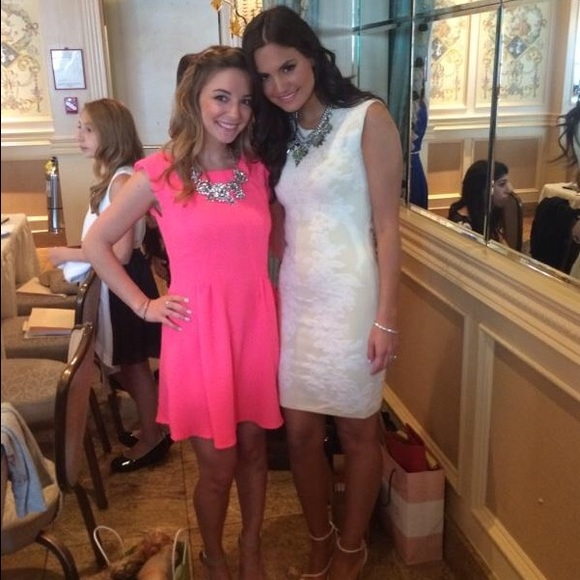 Pink dress on the left
