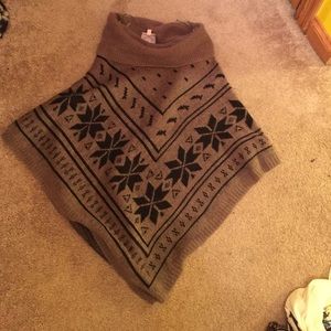 Sleeveless fold over neck poncho