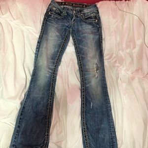 Light wash rock revival jeans