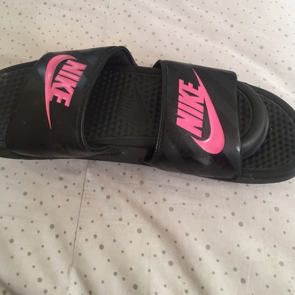 Black/pink nike slide ons