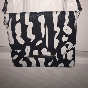 Black and white patterned cross body bag