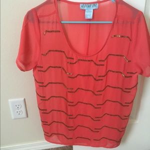 Coral and gold blouse