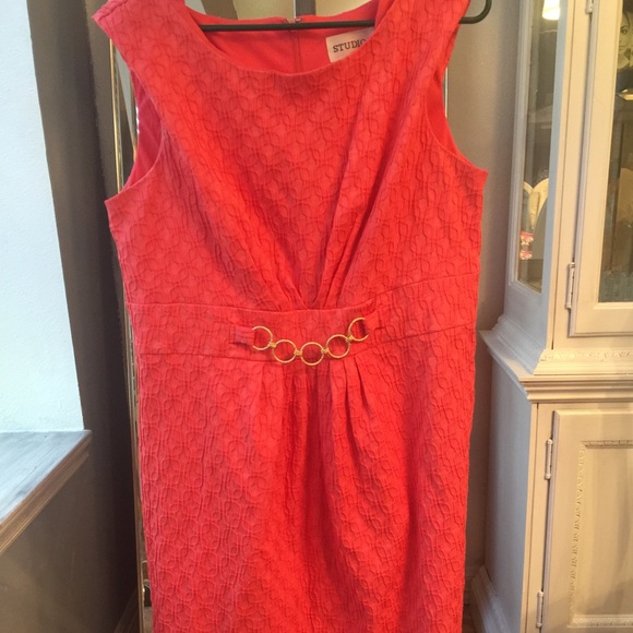 Coral dress with gold chain embellishment