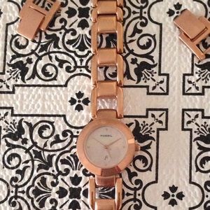 Fossil rose gold colored watch