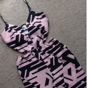 Reserved NWOT patterned body suit.