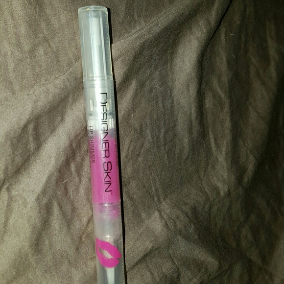 Designer skin sealed lip shimmer