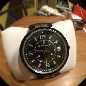 BCBG black watch with a rubber style band.