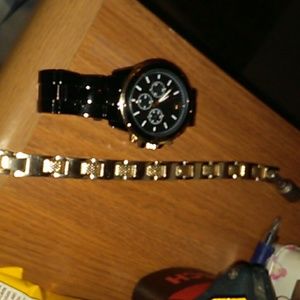 Black gold watch /gold bracelet