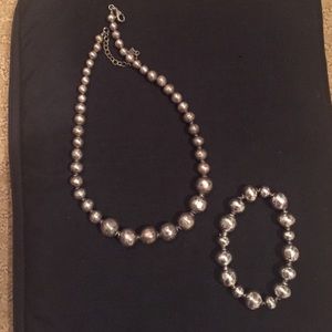 Silver beaded necklace and bracelet