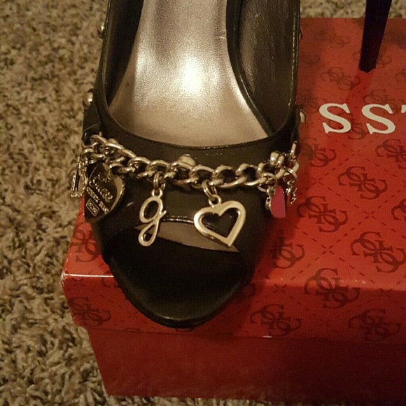 BRAND NEW. USED ONLY ONCE. Guess brand black heels - Picture 2 of 3