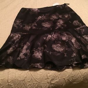 Banana Republic black satin skirt w/ gray floral