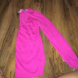 Bright pink cardigan