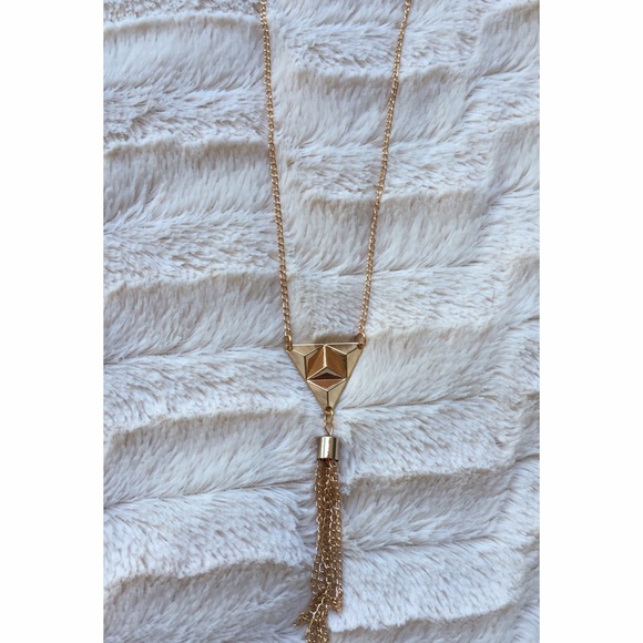 Long gold necklace