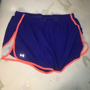 Blue and orange under armour running shorts