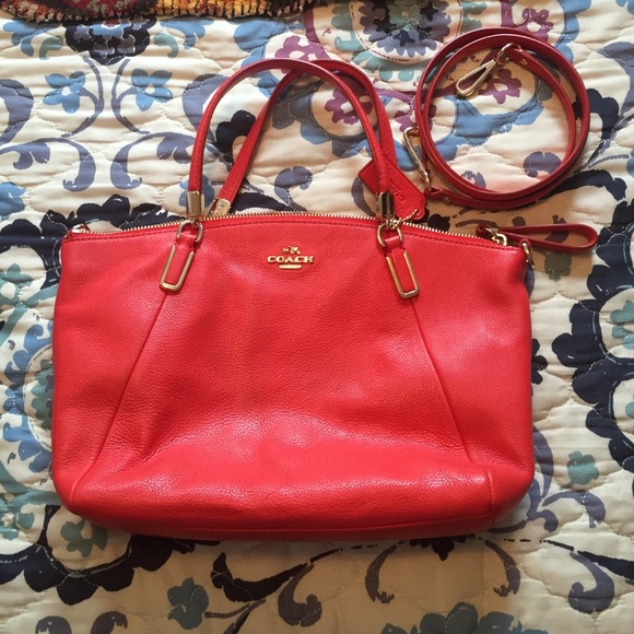 Red coach satchel, good condition.