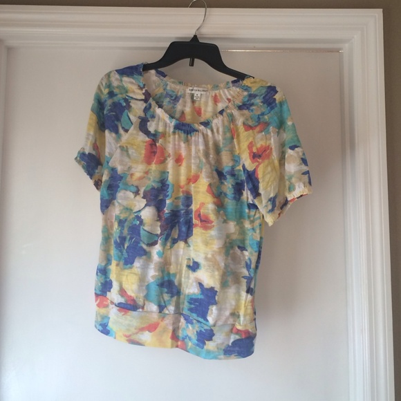 Women's multiple-colored shirt with flowers.