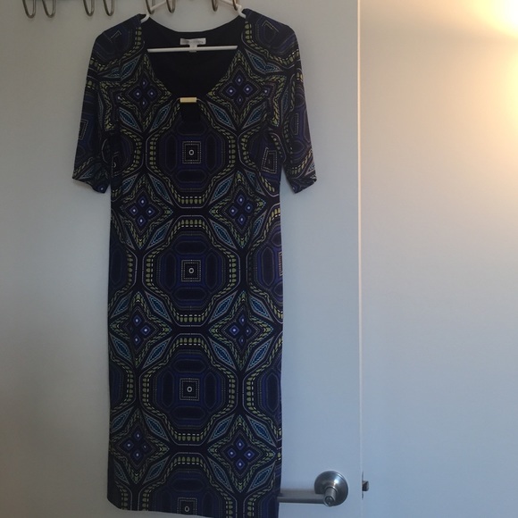 Beautiful color and print dress.