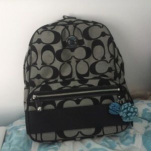 Black and gray coach backpack