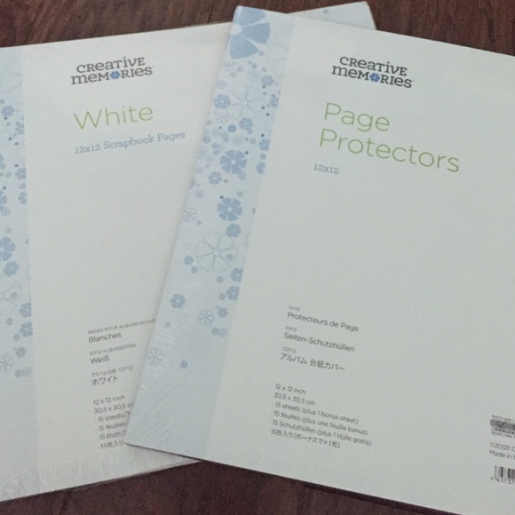 Creative Memories 12x12 pages w/ page protectors.