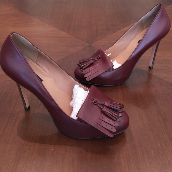 Ann Taylor Burgundy leather pumps with tassel