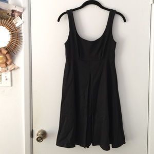 Black fit and flare with open back and bow