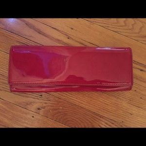 Aldo red patent leather clutch