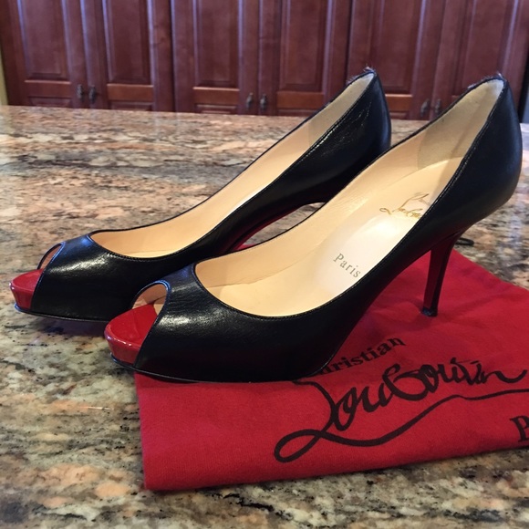 SOLD Authentic Christian Louboutin peep toe