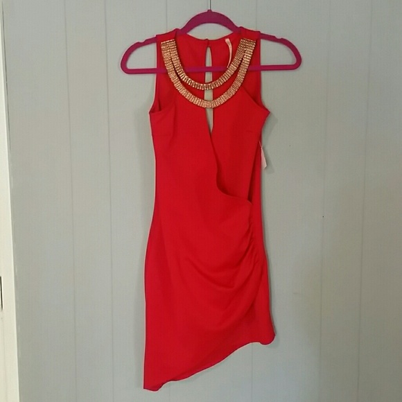 Red asymmetrical dress gold neckline