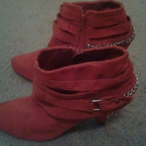 A pair of nice rust orange  boots worn only once