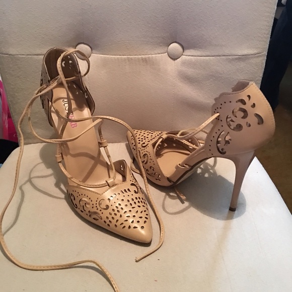 Nude stilettos..