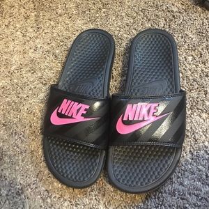 Nike slides.