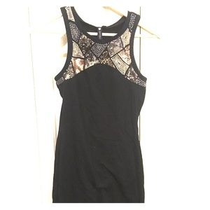 Black and gold sequined tshirt dress