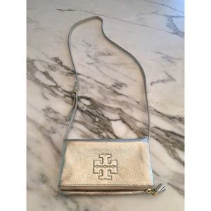 Gold Tory Burch cross body bag never used