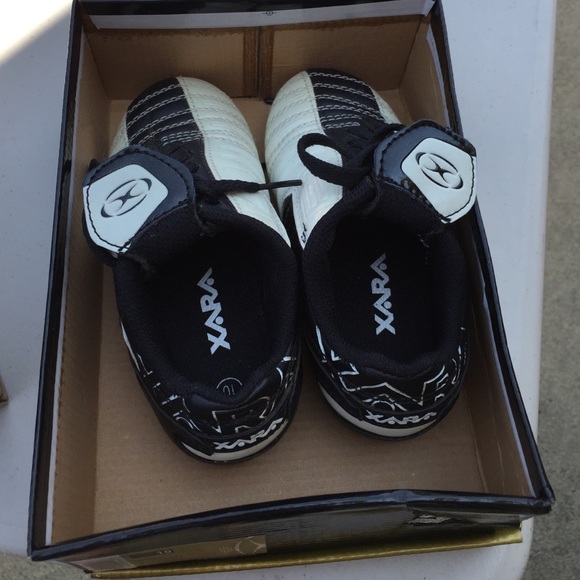 SOLD-Soccer cleats size 10 baby.