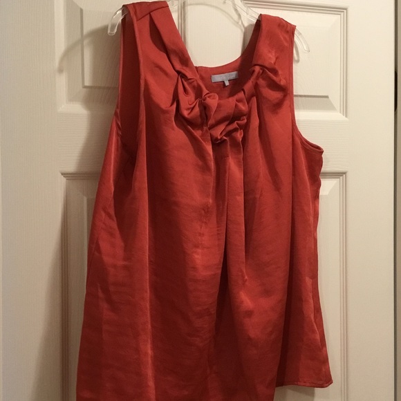 Women's orange sleeveless silky top