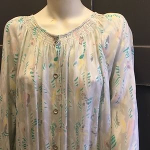 DKNY white with green and yellow pattern.