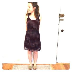 Navy blue and red striped mod-length dress.