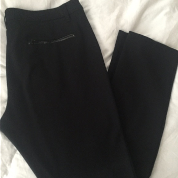 Black skinny dress pants with leather zippers