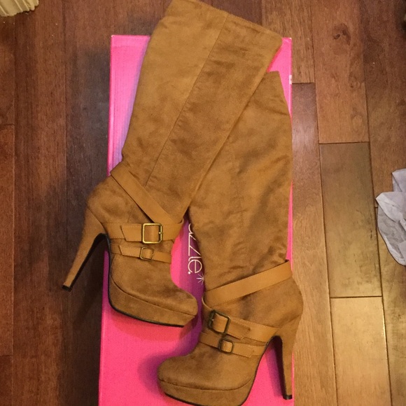 High heeled suede boots. NWOT