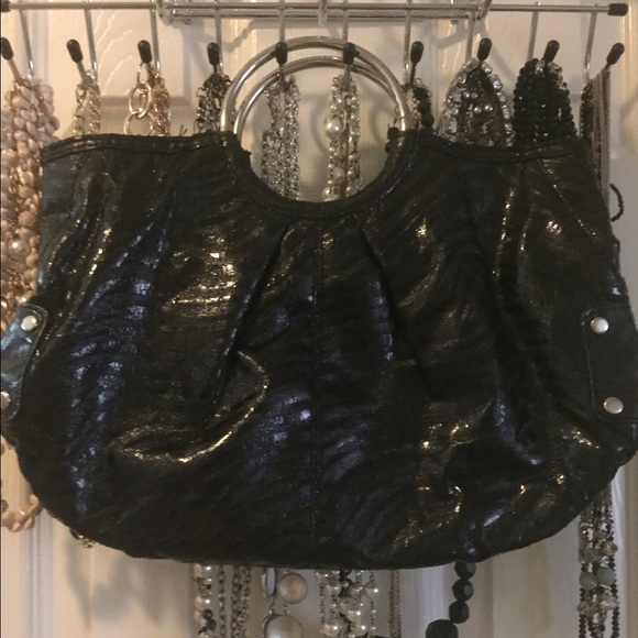 Express handle purse/wristlet.