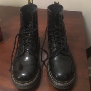 Dr. Marten lace up boots.