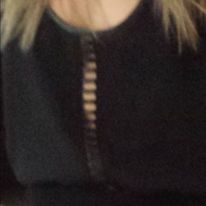 SM black tank top rectangular line lazer cutouts