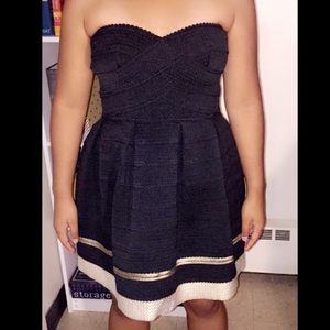 Short black dress with gold strip at the bottom