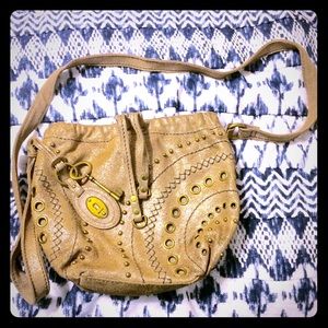 Embroidered Fossil draw string cross body bag