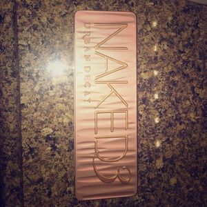 Urban Decay Naked 3 eyeshadow palette.