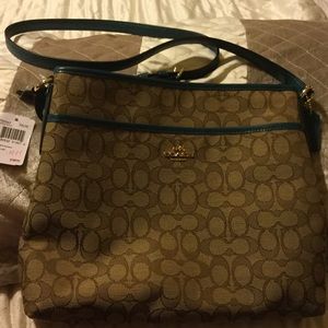 Authentic Coach Cross-body Handbag.