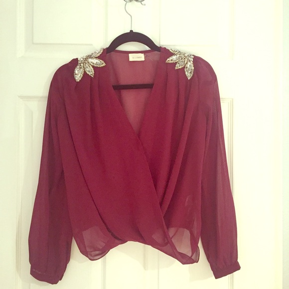 Semisheer shoulder detail drape top