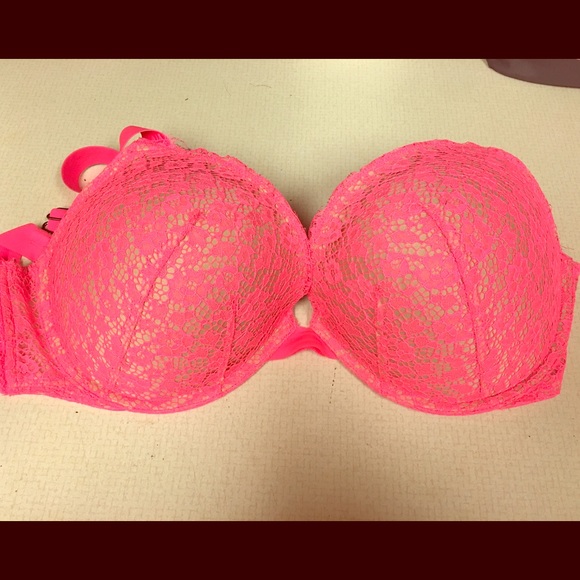 Nude bra with pink straps and pink overlay